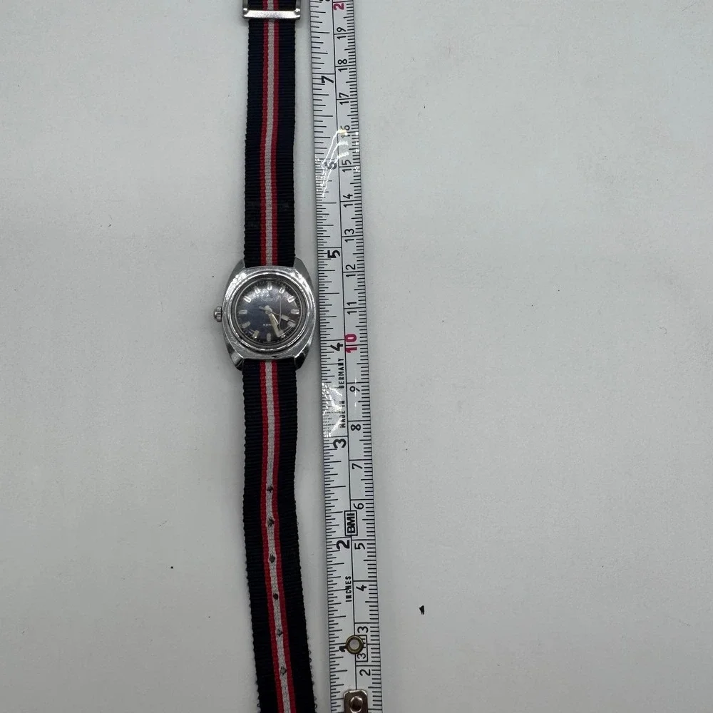 Vintage Timex Electric Watch Black Dial Silver Case Striped Nylon Strap Untested